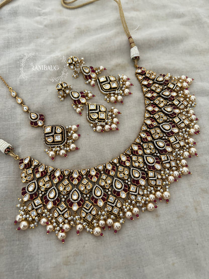 Navya Creamy Pearls Rich Gold Finish Polki Kundan Stuuded Bridal Necklace Jewellery Set With Maang Tikka By Ranibaug