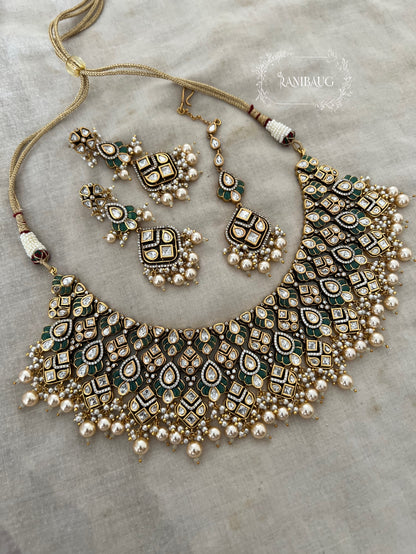Navya Creamy Pearls Rich Gold Finish Polki Kundan Stuuded Bridal Necklace Jewellery Set With Maang Tikka By Ranibaug