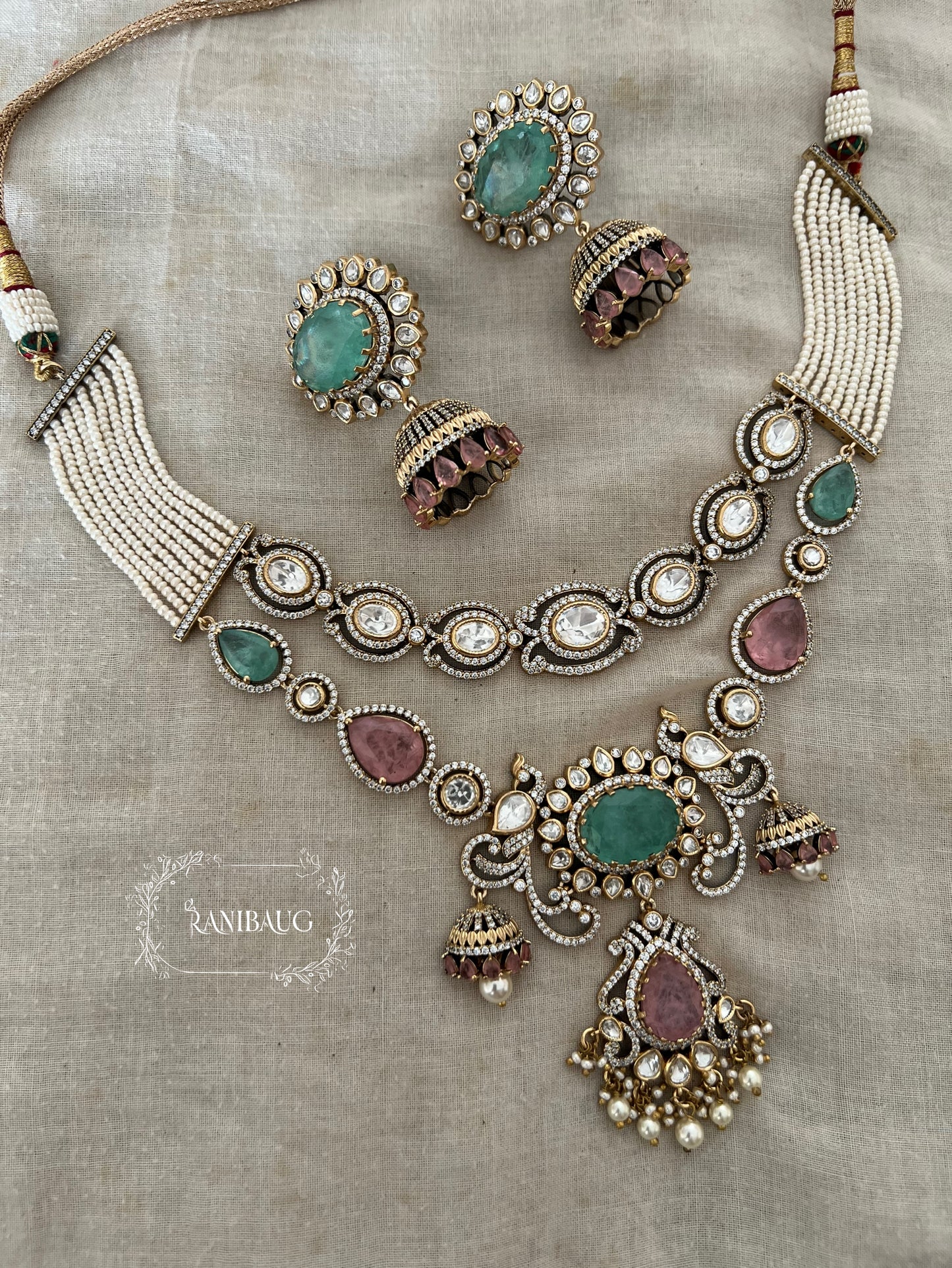 Navya Victorian Pastel Vintage Peacock Necklace Set In Polki And Pearl Detailing By Ranibaug