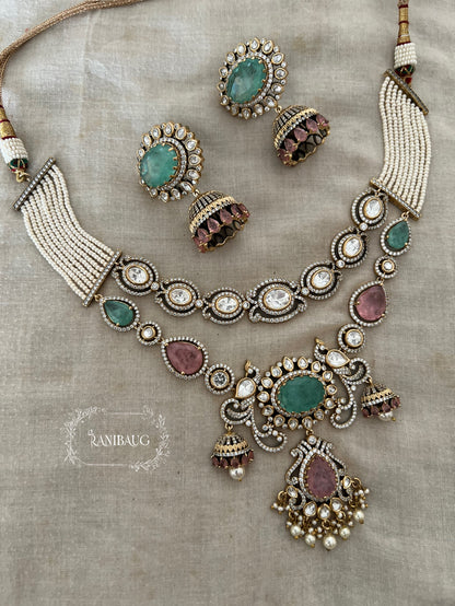 Navya Victorian Pastel Vintage Peacock Necklace Set In Polki And Pearl Detailing By Ranibaug