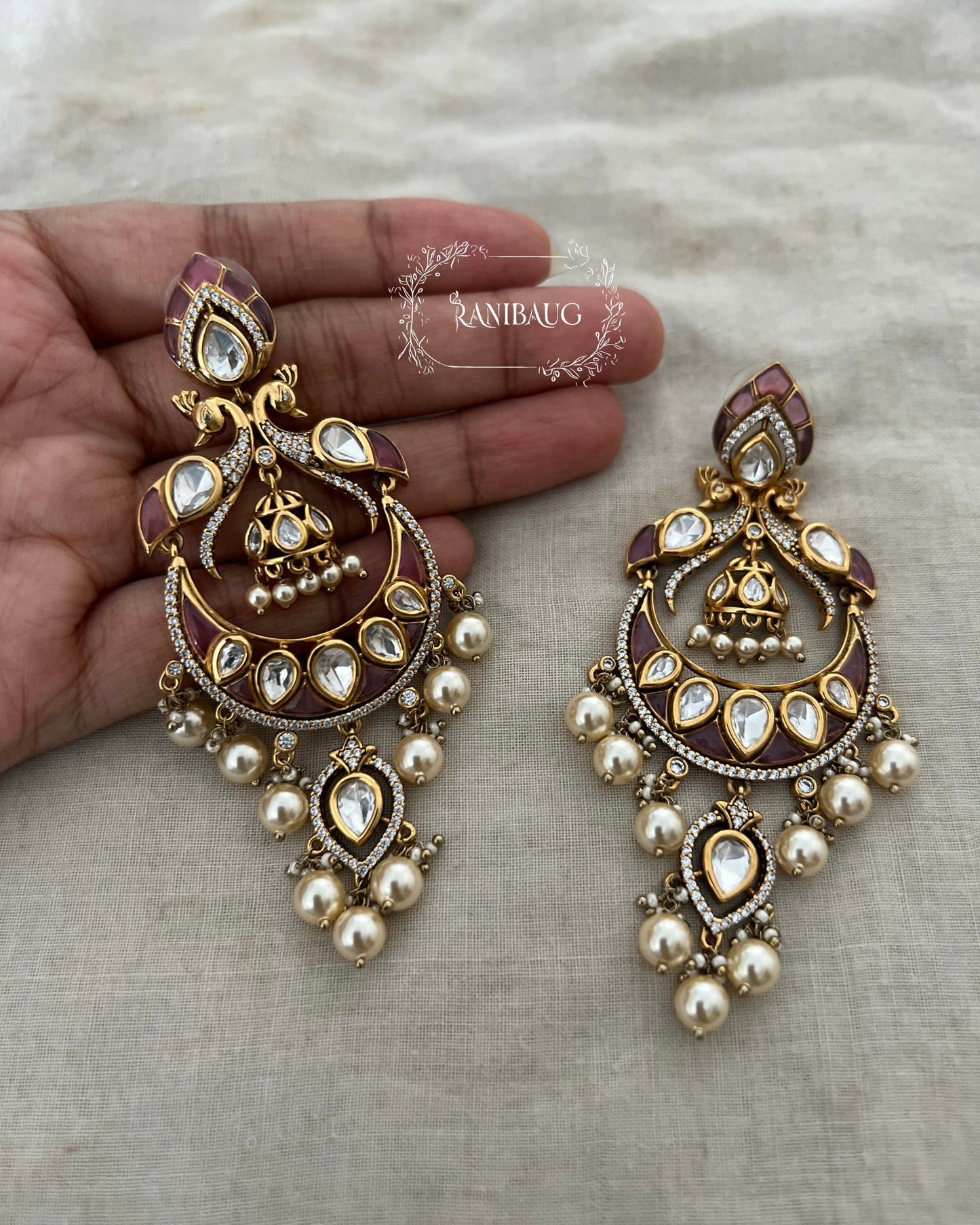 Nayani Victorian Finish Polki And Peral Adorned Peacock Chandbali With Jhumki Dangler Motif By Ranibaug