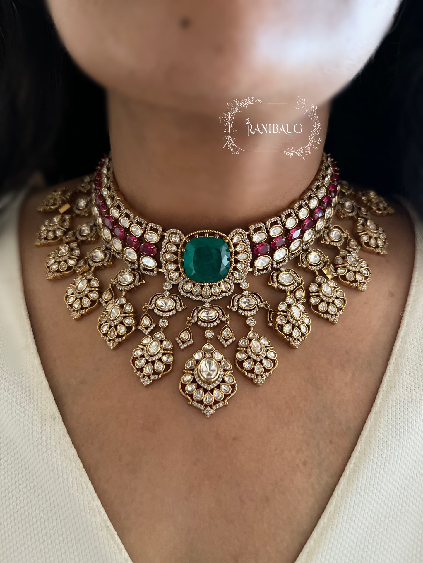 Nayera Mossainite Polki Victorian Gold Finish Necklace Jewelry Set With Maang Tikka And Emerald Ruby Stone Accents By Ranibaug