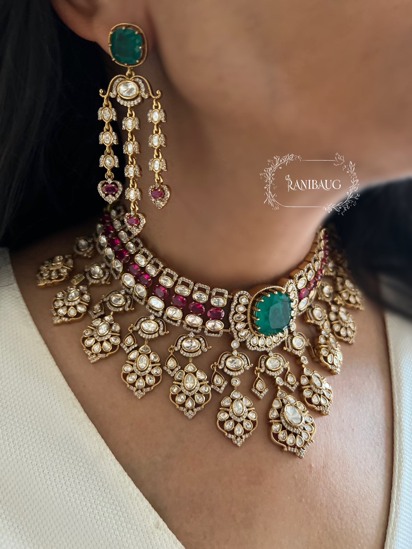 Nayera Mossainite Polki Victorian Gold Finish Necklace Jewelry Set With Maang Tikka And Emerald Ruby Stone Accents By Ranibaug