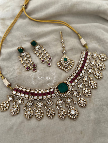 Nayera Mossainite Polki Victorian Gold Finish Necklace Jewelry Set With Maang Tikka And Emerald Ruby Stone Accents By Ranibaug