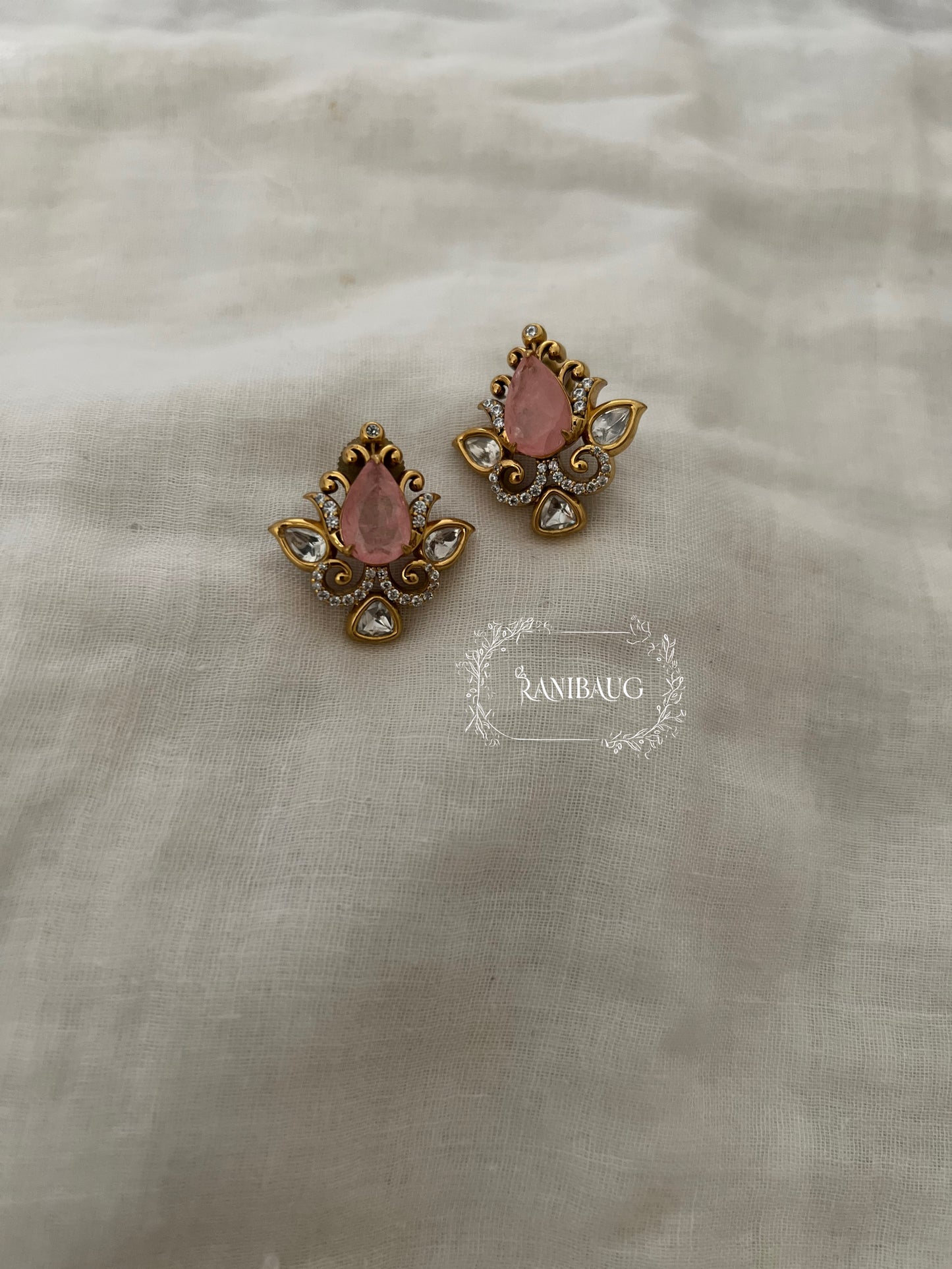 Nayera Teardrop Gemstone Motif Gold Finish Intricate Designer Polki Ear Studs By Ranibaug