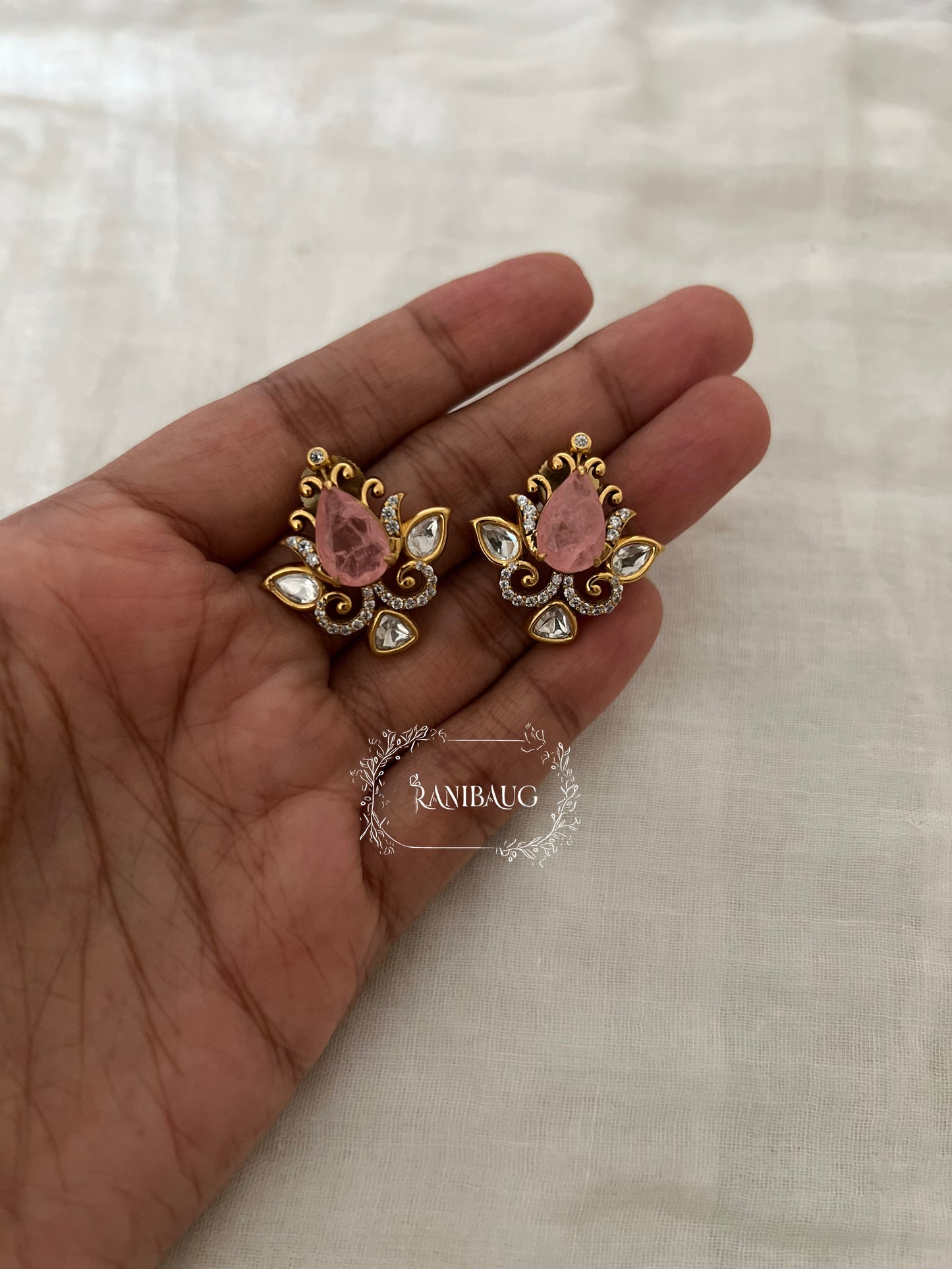 Nayera Teardrop Gemstone Motif Gold Finish Intricate Designer Polki Ear Studs By Ranibaug