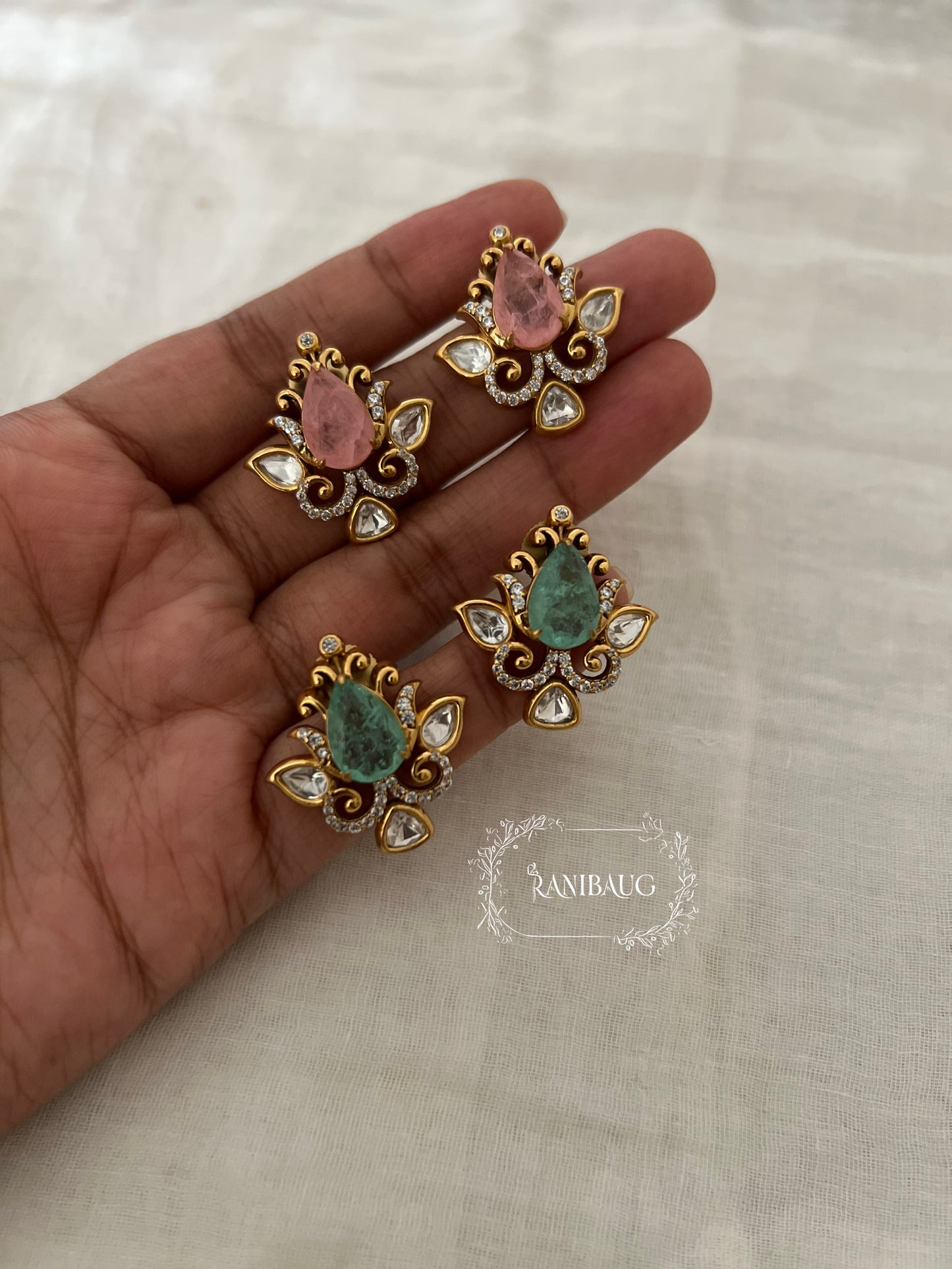 Nayera Teardrop Gemstone Motif Gold Finish Intricate Designer Polki Ear Studs By Ranibaug