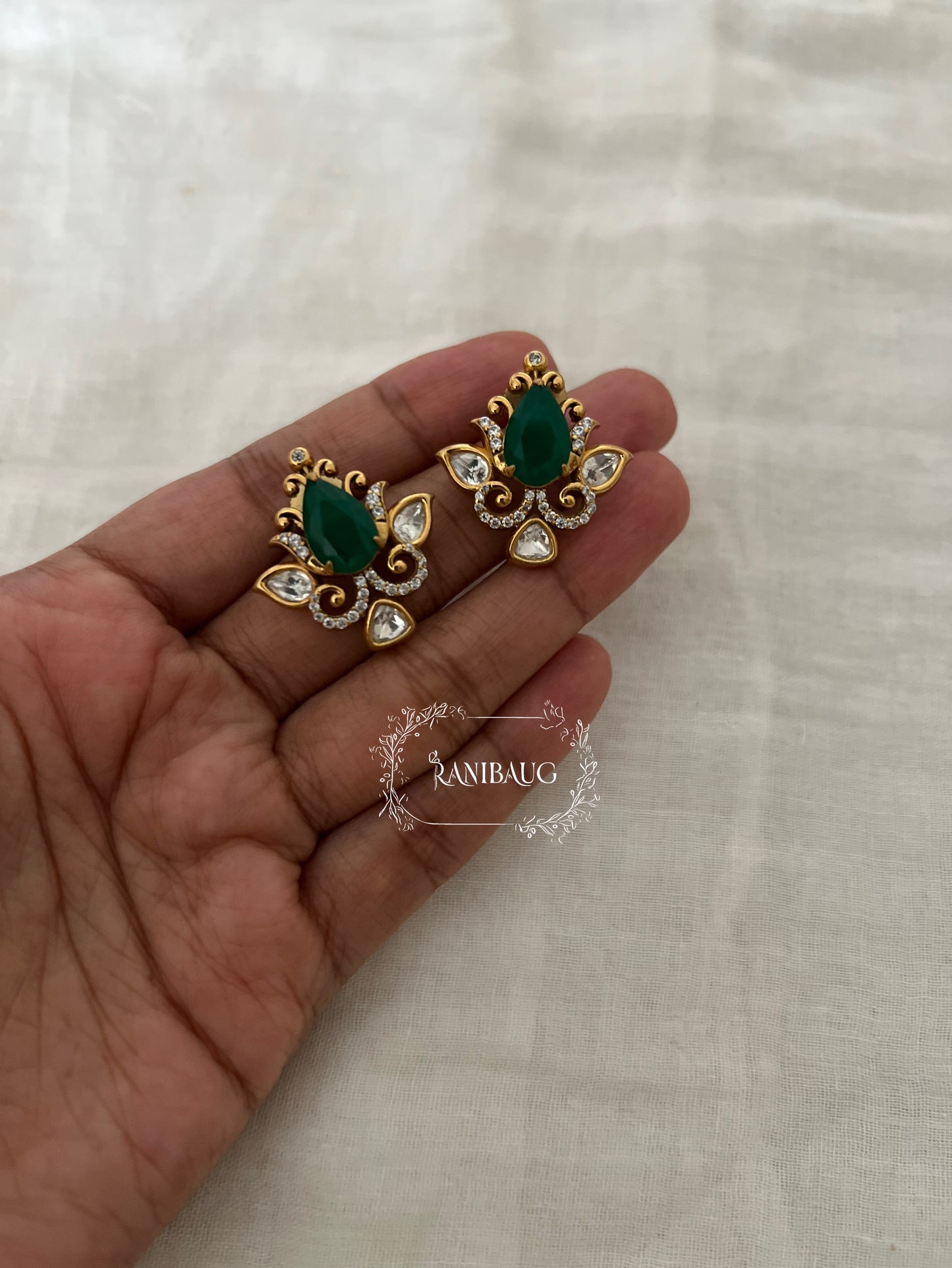 Nayera Teardrop Gemstone Motif Gold Finish Intricate Designer Polki Ear Studs By Ranibaug