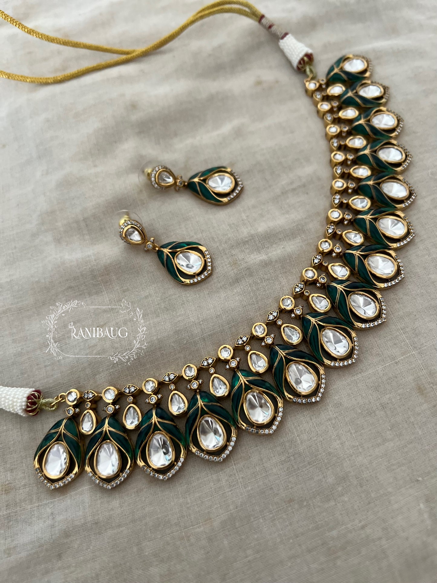 Naysha Polki Kundan Studded Emerald Leaf Enamel Polki Necklace Set By Ranibaug