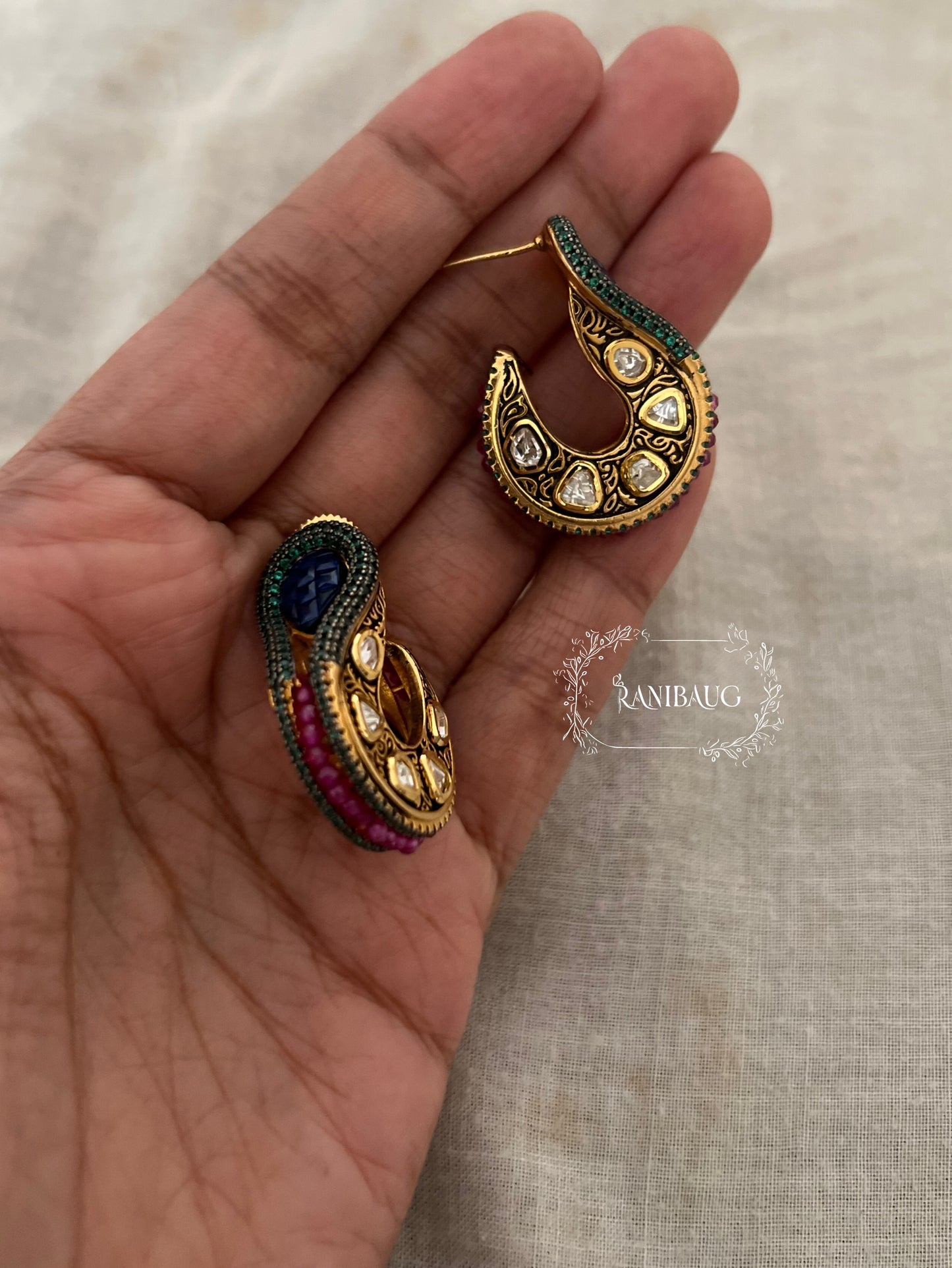 Neelam Antique Gold Finish Polki Studded Paisley Motif Designer Ear Studs By Ranibaug