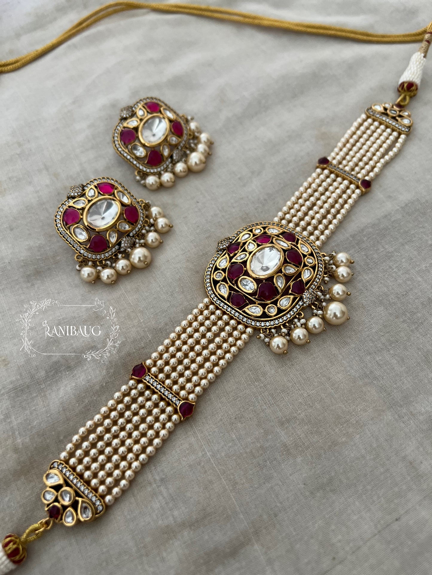 Neha Gold Plated Pearl Beaded Mesh Choker Set In Pink And Purple Tones By Ranibaug