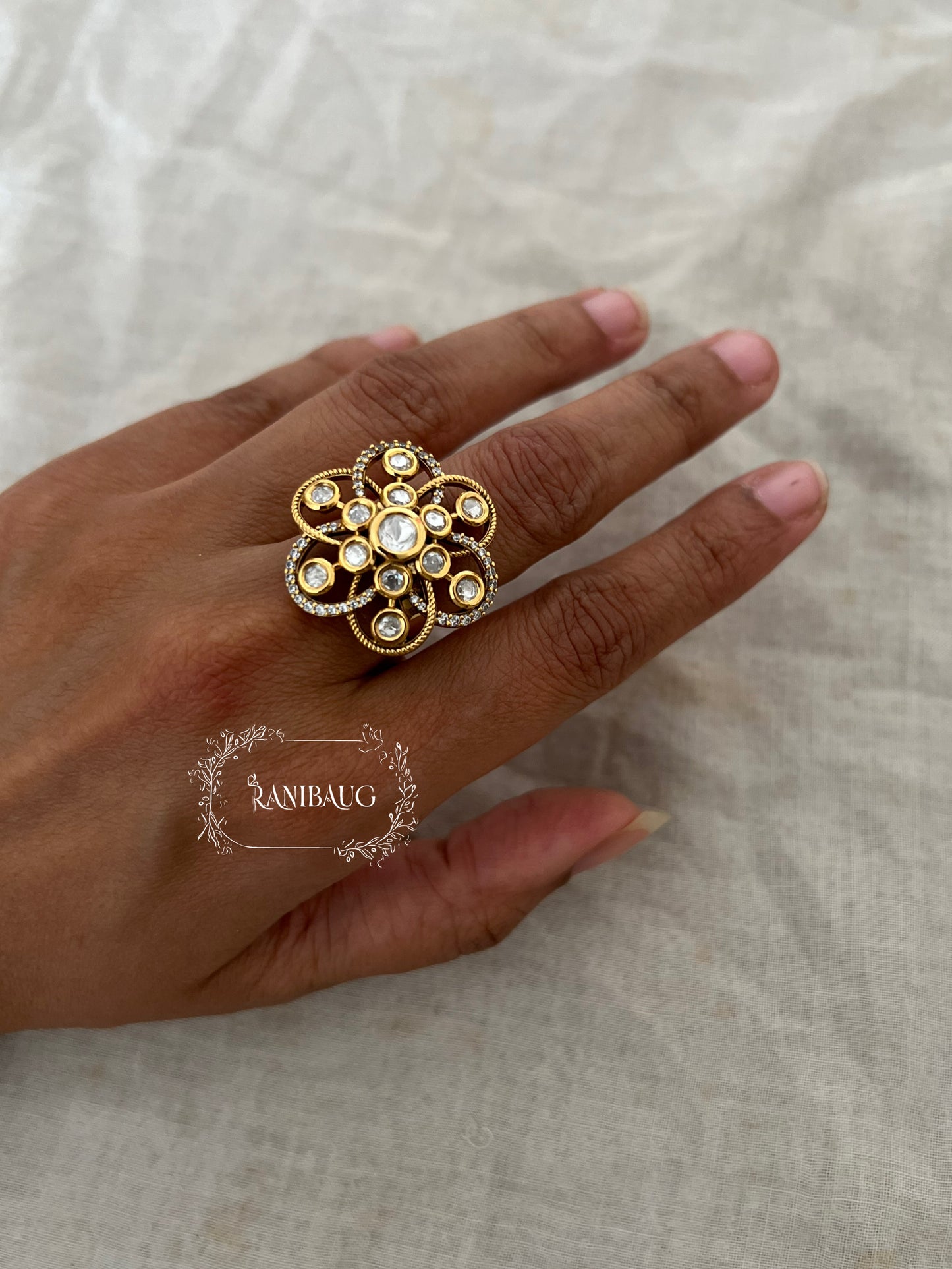 Niharika Universe Floral Bloom Ring In Premium Gold Tone Studded With Polki Kundan Stones By Ranibaug