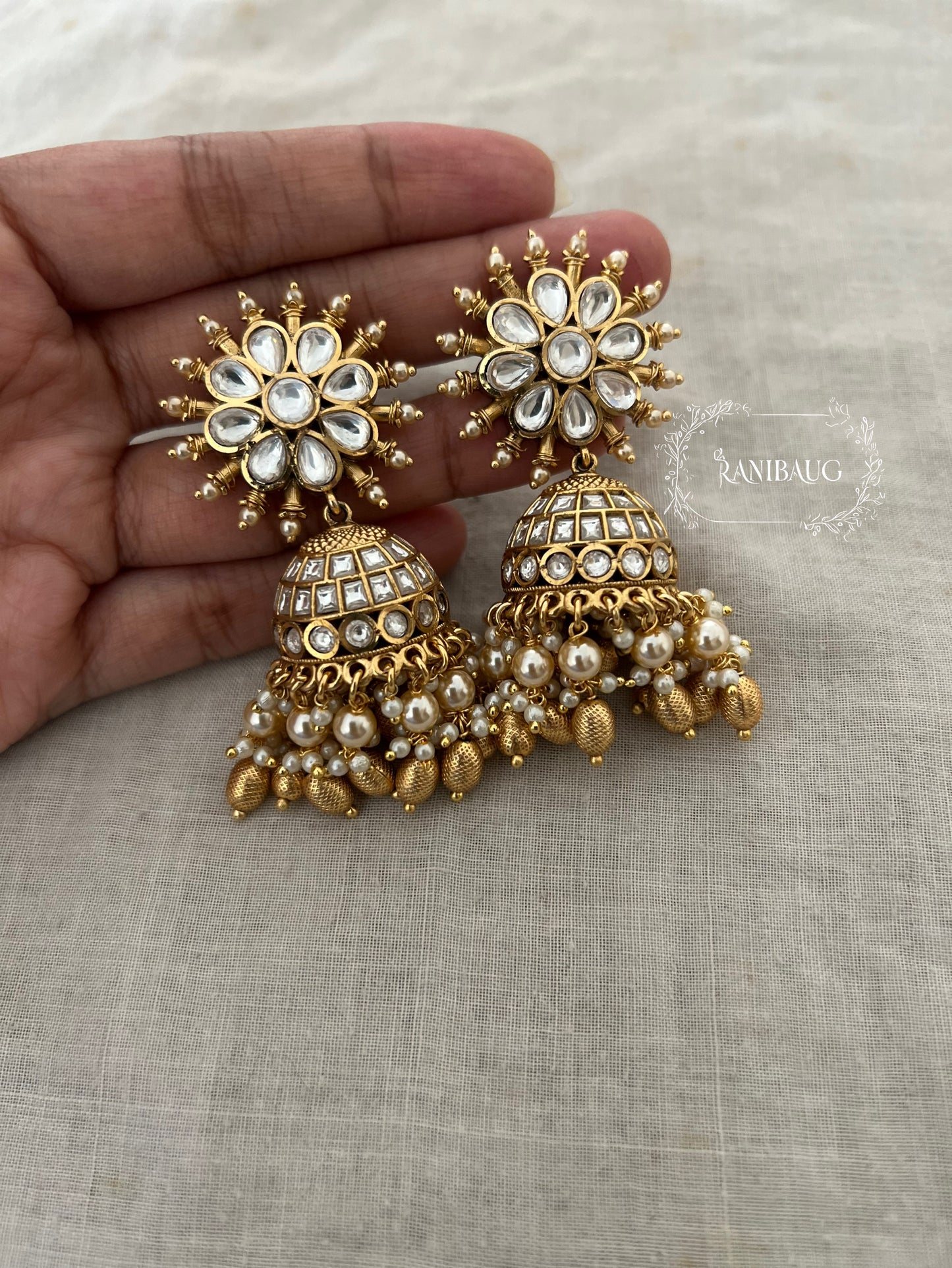 Nikhar Floral Sunburst Antique Gold Kundan Pearl And Bead Fringe Jhumkas By Ranibaug