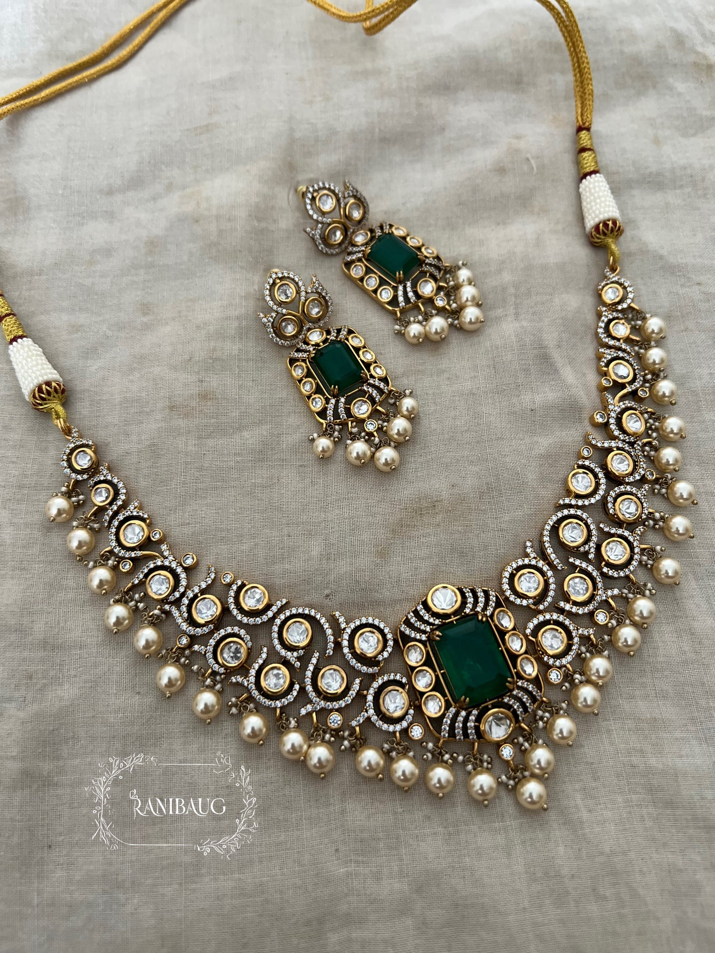 Nilakshi Gold Finish Rich Pearl Adorned Polki Studded Royal Statement Necklace Set By Ranibaug