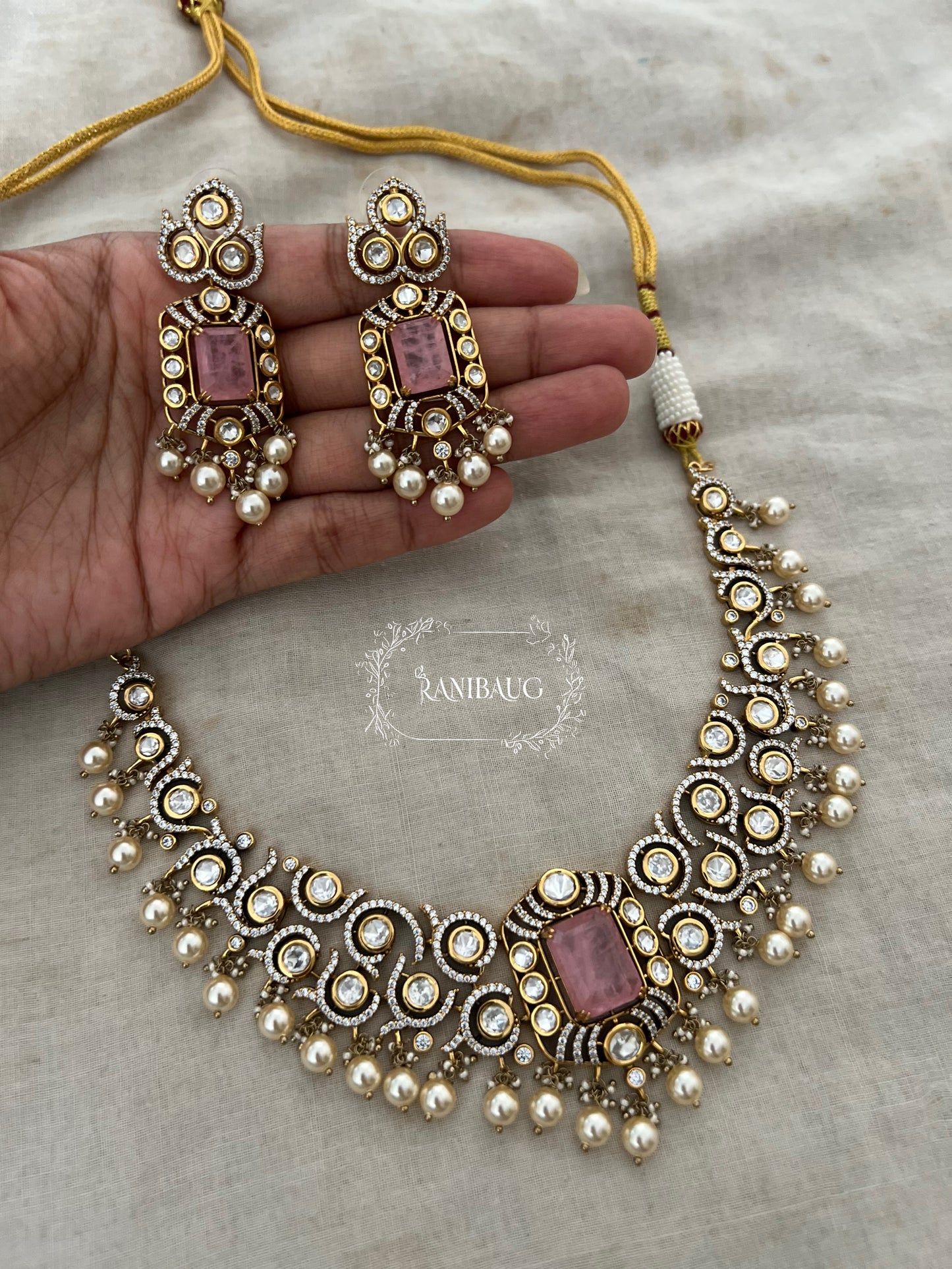 Nilakshi Gold Finish Rich Pearl Adorned Polki Studded Royal Statement Necklace Set By Ranibaug