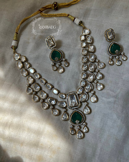 Nishi Royal Polki Kundan Studded Gold Finish Layered Necklace Set With Earrings By Ranibaug