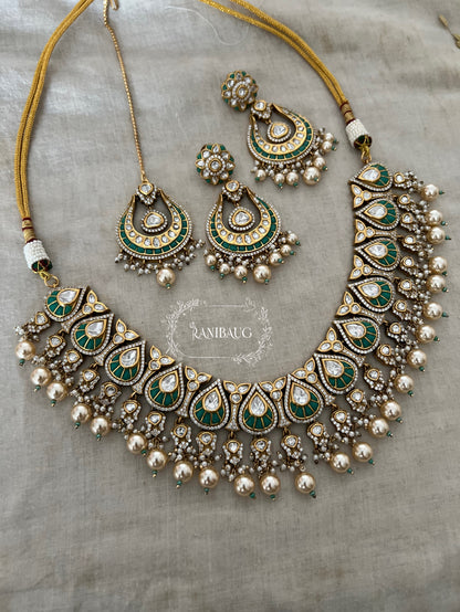 Nita Polki Kundan Necklace Set In Teardrop Enamel Motifs And Shiny Pearl Fringes In Premium Gold Finish With Contrasting Maangtikka By Ranibaug