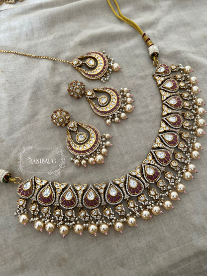 Nita Polki Kundan Necklace Set In Teardrop Enamel Motifs And Shiny Pearl Fringes In Premium Gold Finish With Contrasting Maangtikka By Ranibaug