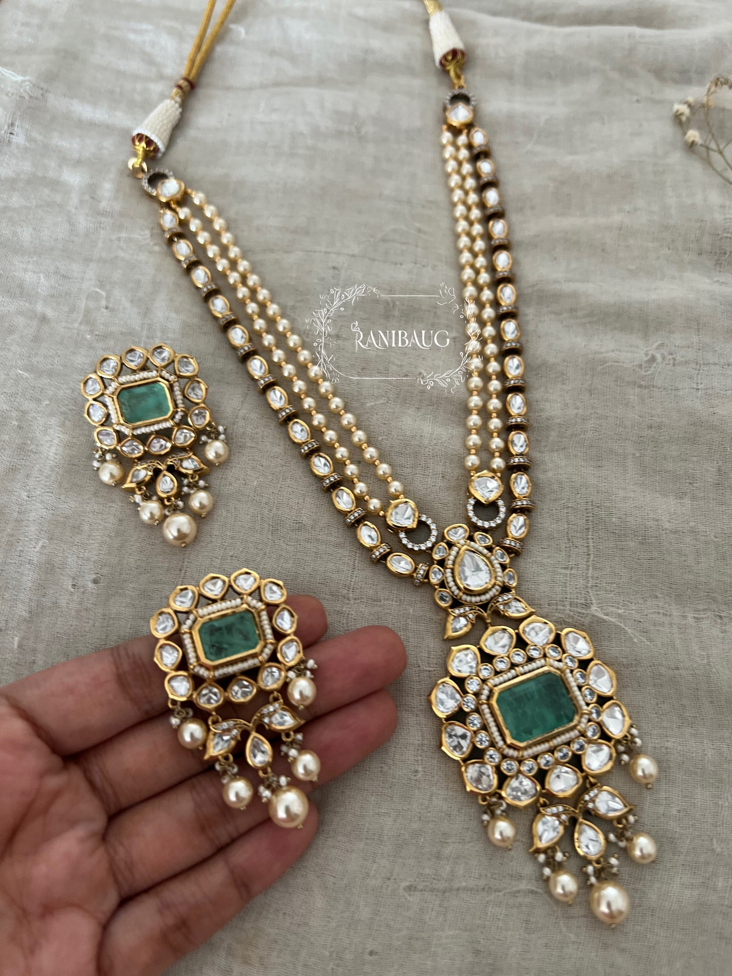 Nitara Mossainite Polki Studded Rich Gold Finish Pearl Adorned Necklace Jewellery Set By Ranibaug