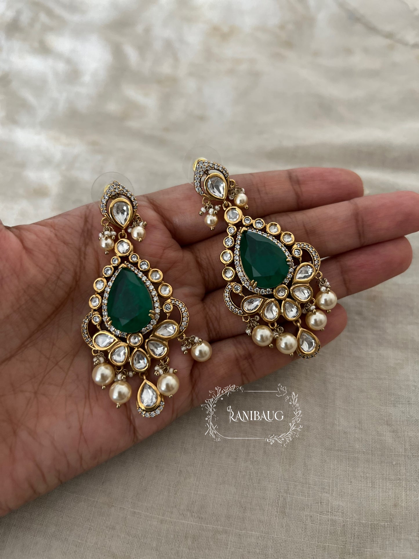 Nitara Peacock Motif Polki And Pearl Adorned Gemstone Studded Chandelier Festive Earrings By Ranibaug