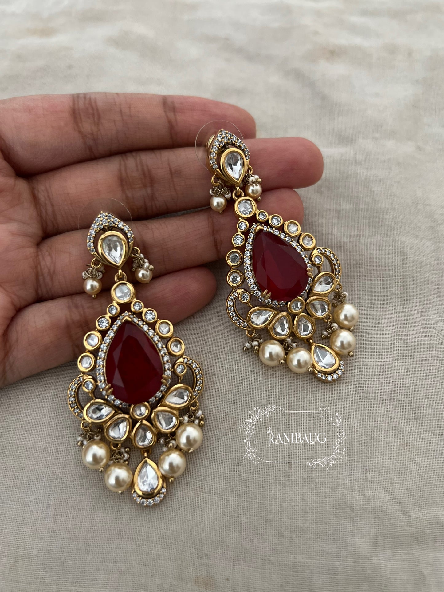 Nitara Peacock Motif Polki And Pearl Adorned Gemstone Studded Chandelier Festive Earrings By Ranibaug