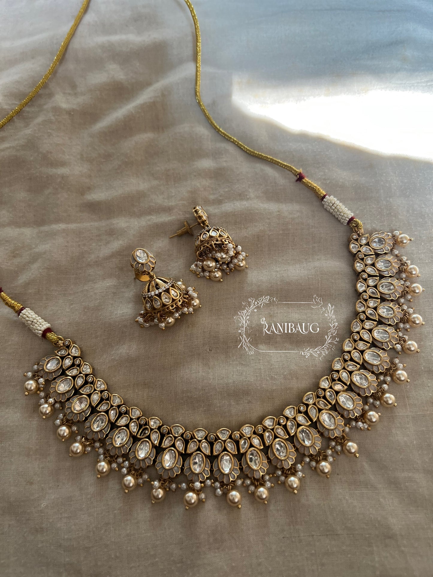 Nitisha Polki Kundan Studded Pearl Fringe Choker Necklace Set With Jhumki By Ranibaug