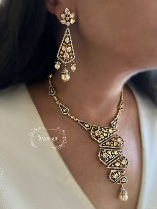 Niyati Geometric Designer Floral Vines Necklace Set Adorned In Polki And Pearls In Rich Gold Finish By Ranibaug