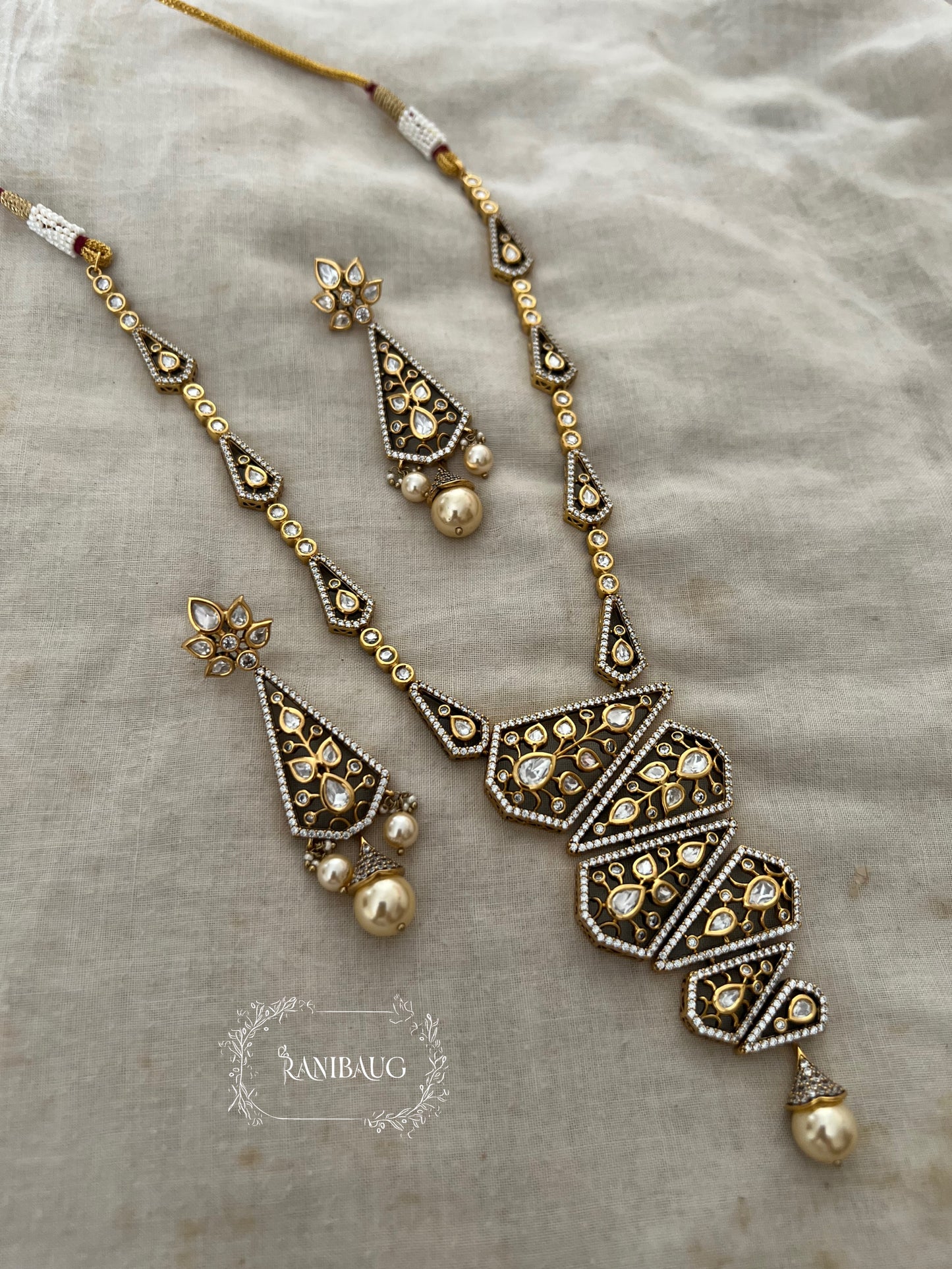 Niyati Geometric Designer Floral Vines Necklace Set Adorned In Polki And Pearls In Rich Gold Finish By Ranibaug
