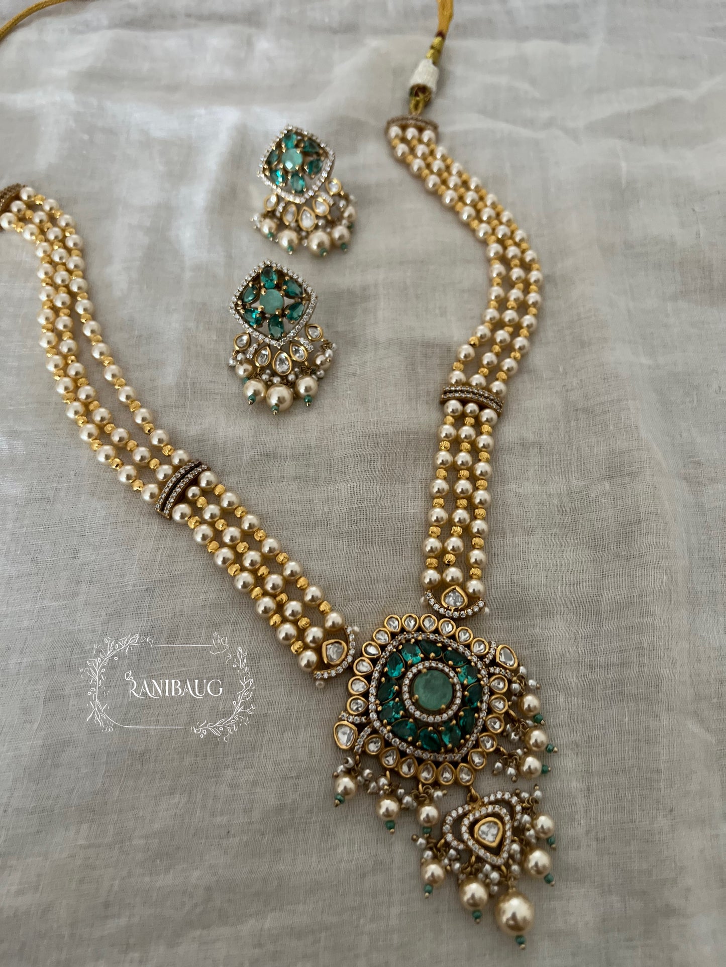 Niyukti Gold Pearl Beaded Rich Finish Polki Studded Designer Festive Necklace Set By Ranibaug | The Royal Wedding Collection 2026