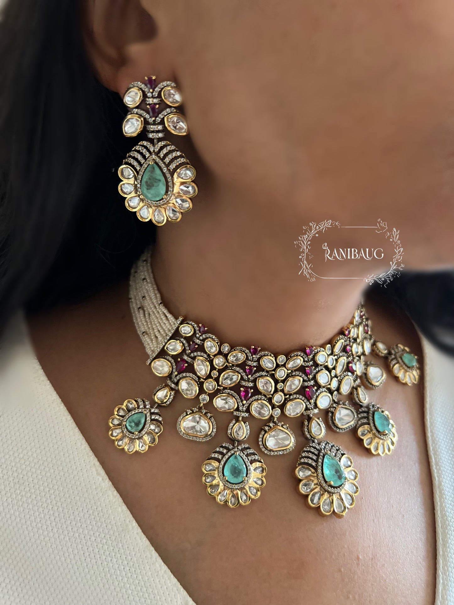 Nysa Vintage Floral Motif Mint And Ruby Accent Polki Studded Necklace Set In Matt Gold Finish By Ranibaug