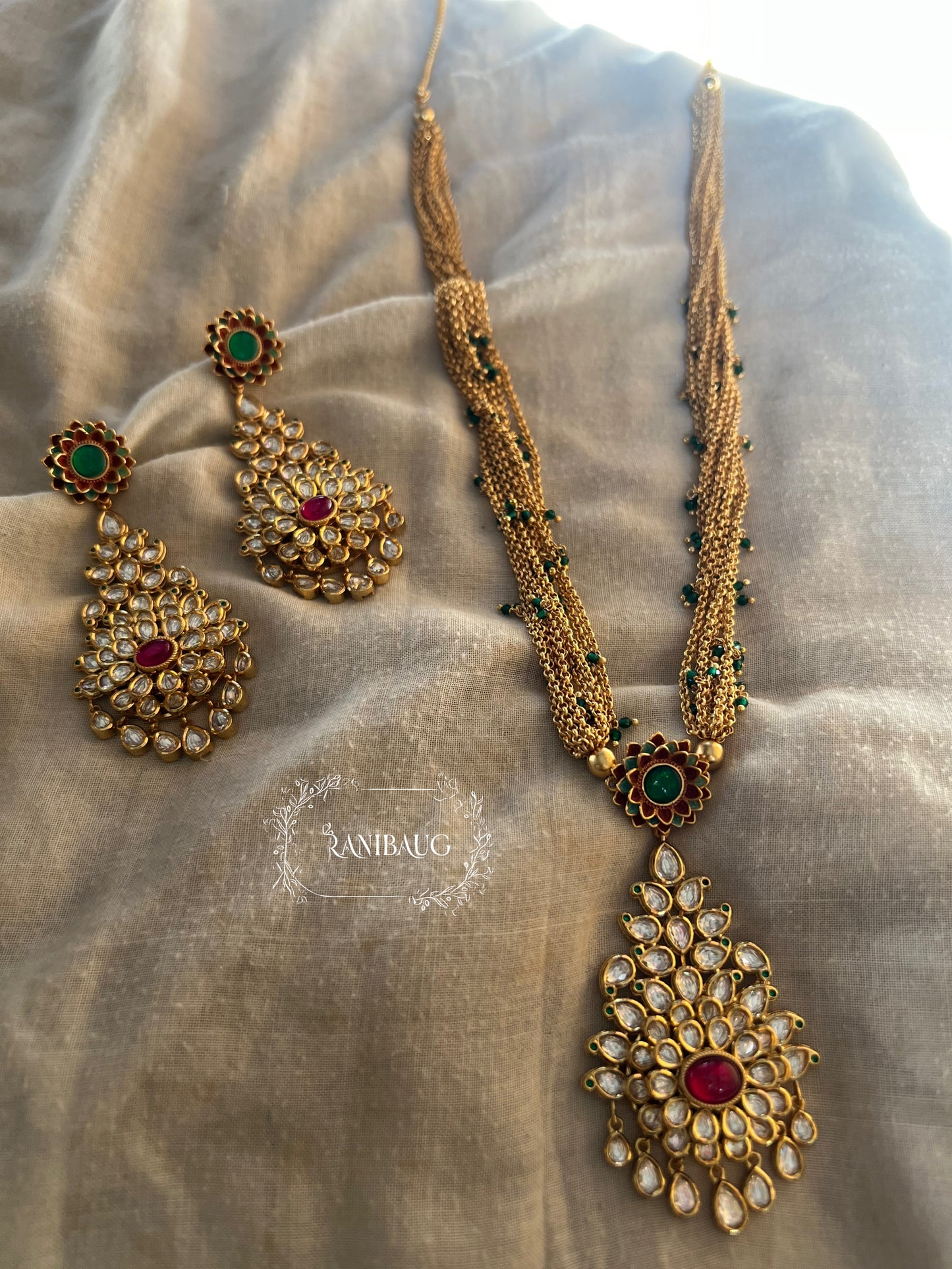 Padmashree Gold Temple Inspired Polki Kundan Necklace Jewelry Set In Emerald And Ruby Accents By Ranibaug