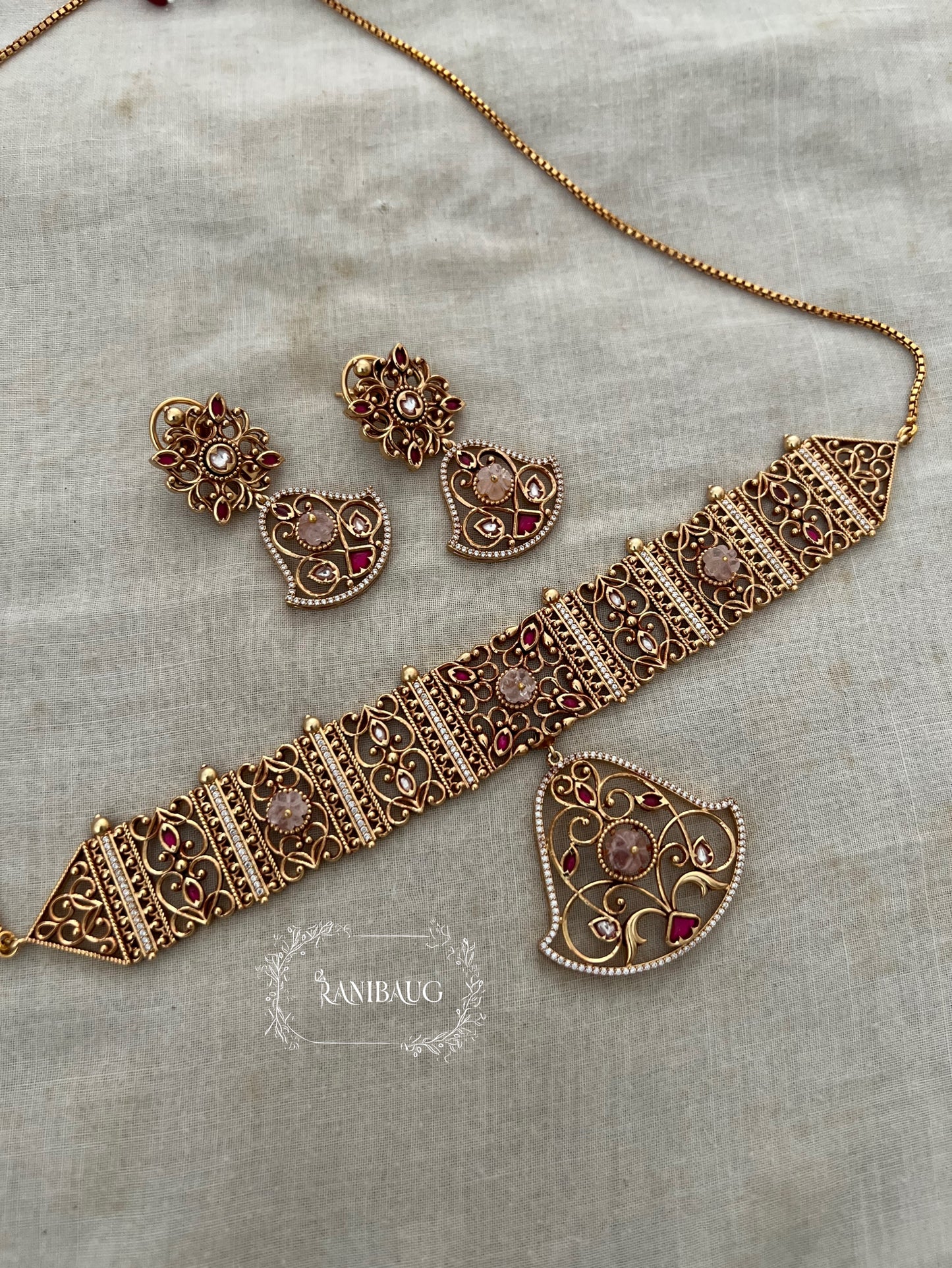 Padmavati Gold Plated Pendant Style Heritage Choker Set By Ranibaug | Trendy Temple Jewelry For Saree