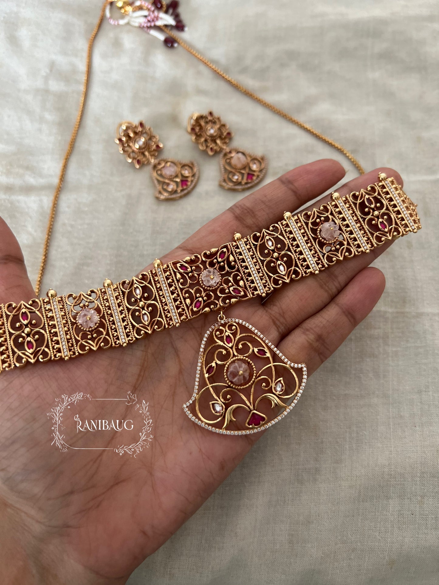 Padmavati Gold Plated Pendant Style Heritage Choker Set By Ranibaug | Trendy Temple Jewelry For Saree