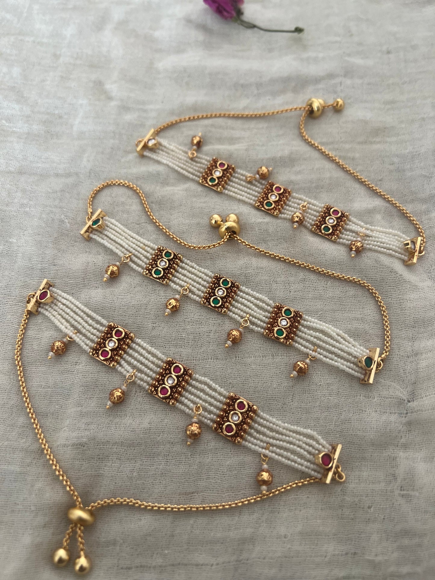 Padmini Pearl Strand Gold Finish Beaded Dangle Bracelet By Ranibaug