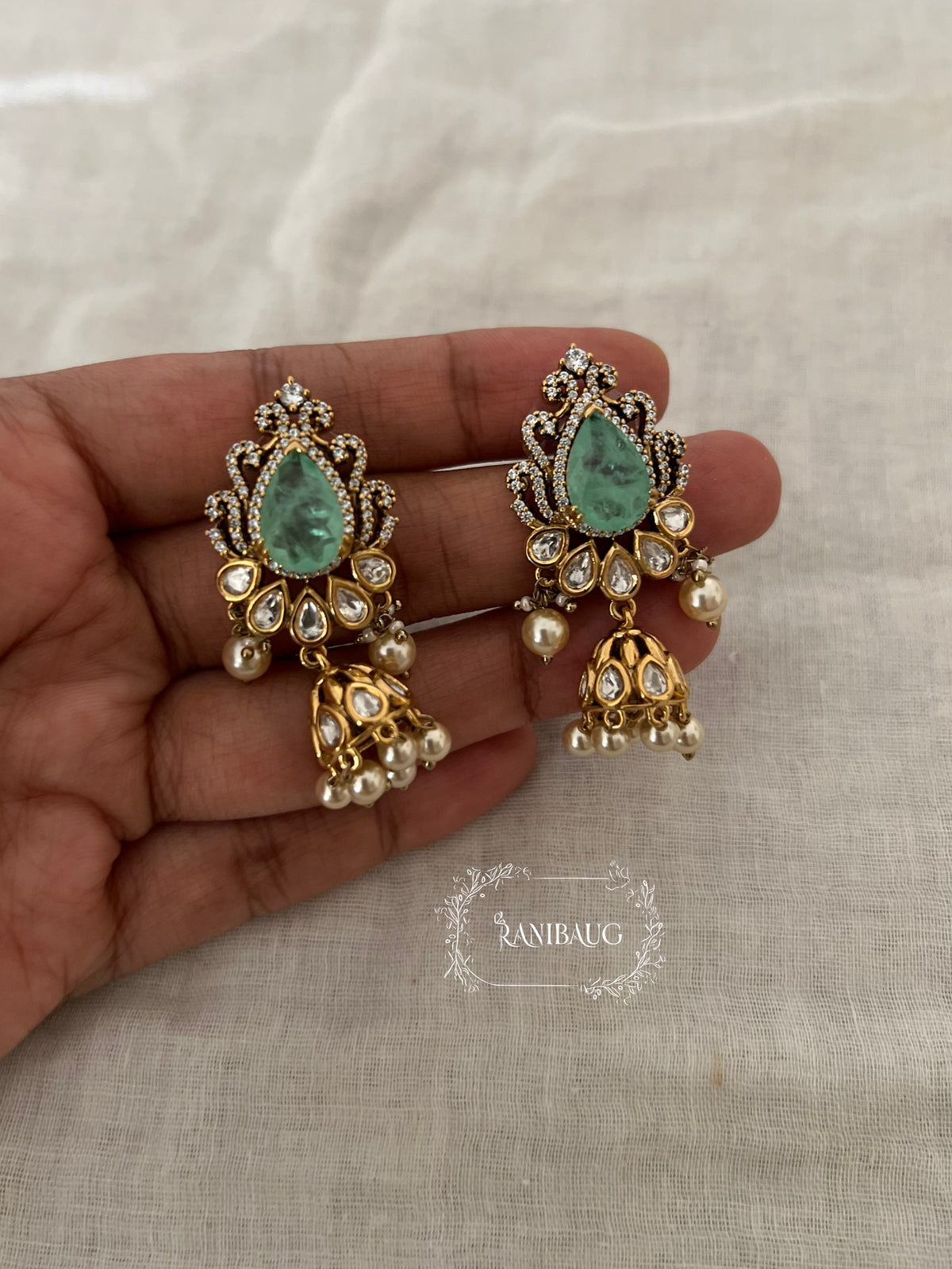 Palak Gold Finish Pearl Jhumki Festive Earrings By Ranibaug