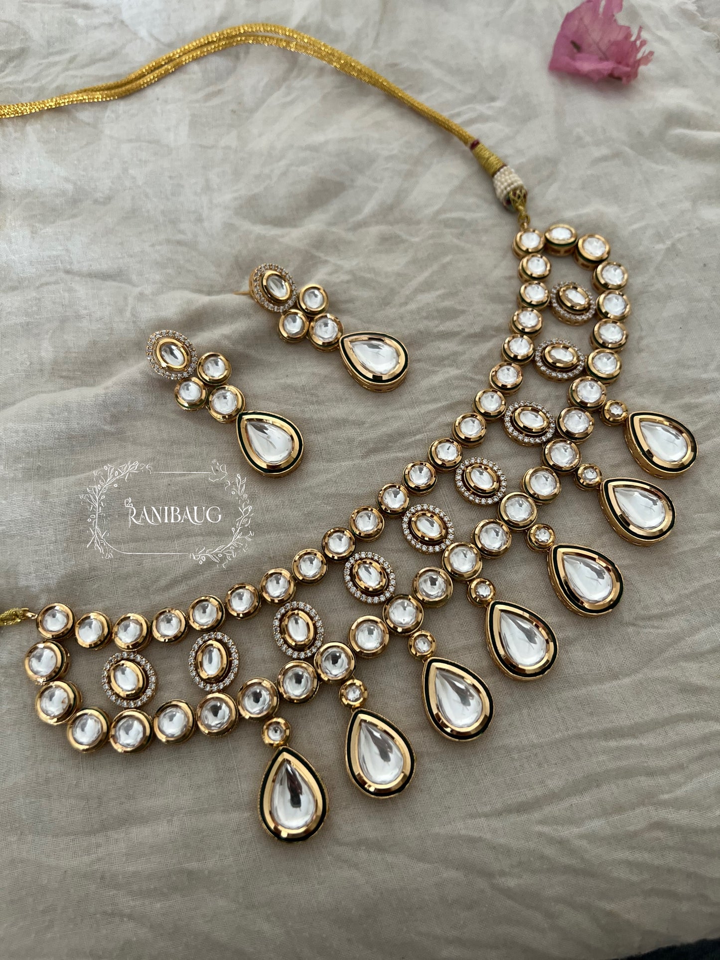 Pari Lavish Mossainite Statement Jewellery Set In Premium Gold Finish By Ranibaug | Trendy Wedding Jewellery Set