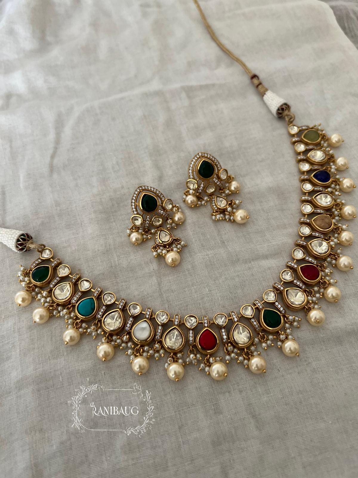 Parinita Multicolor Traditional Royal Mossainite Polki Gold Finish Subtle Necklace Set By Ranibaug