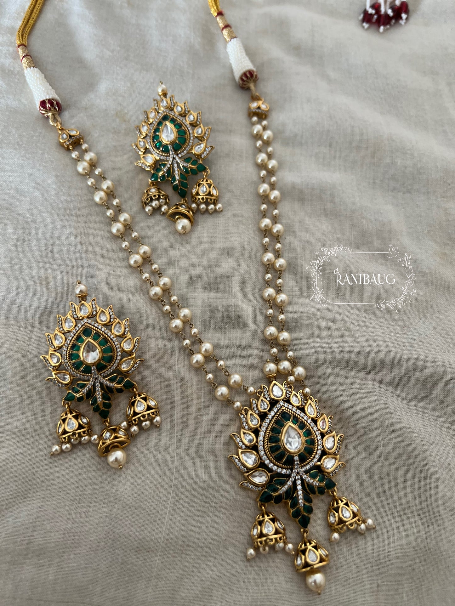 Prachi Long Teardrop Pearl Necklace Set With Jhumki Dangler Pendant Style In Premium Gold Finish By Ranibaug