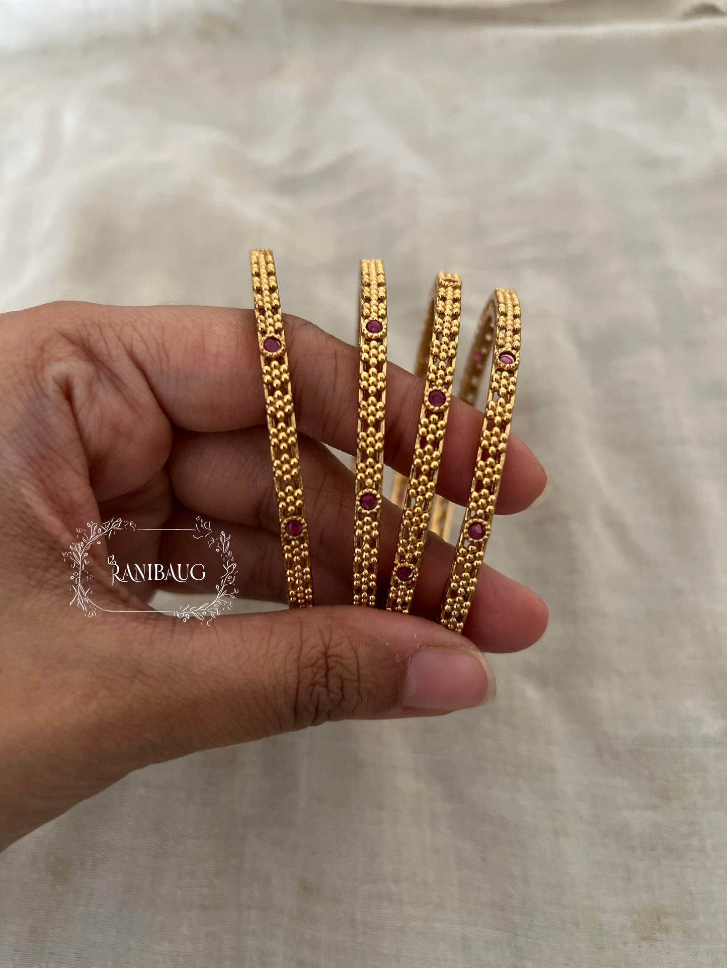 Preet Heritage Ruby Studded Gold Bangles By Ranibaug (Set Of 4)