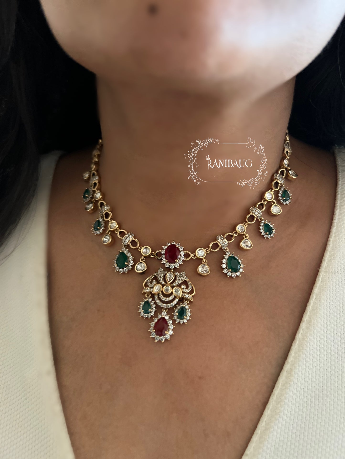 Pritisha Gold Finish Polki Ruby And Emerald Multi Color Drop Motif Designer Necklace Set By Ranibaug