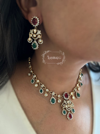 Pritisha Gold Finish Polki Ruby And Emerald Multi Color Drop Motif Designer Necklace Set By Ranibaug