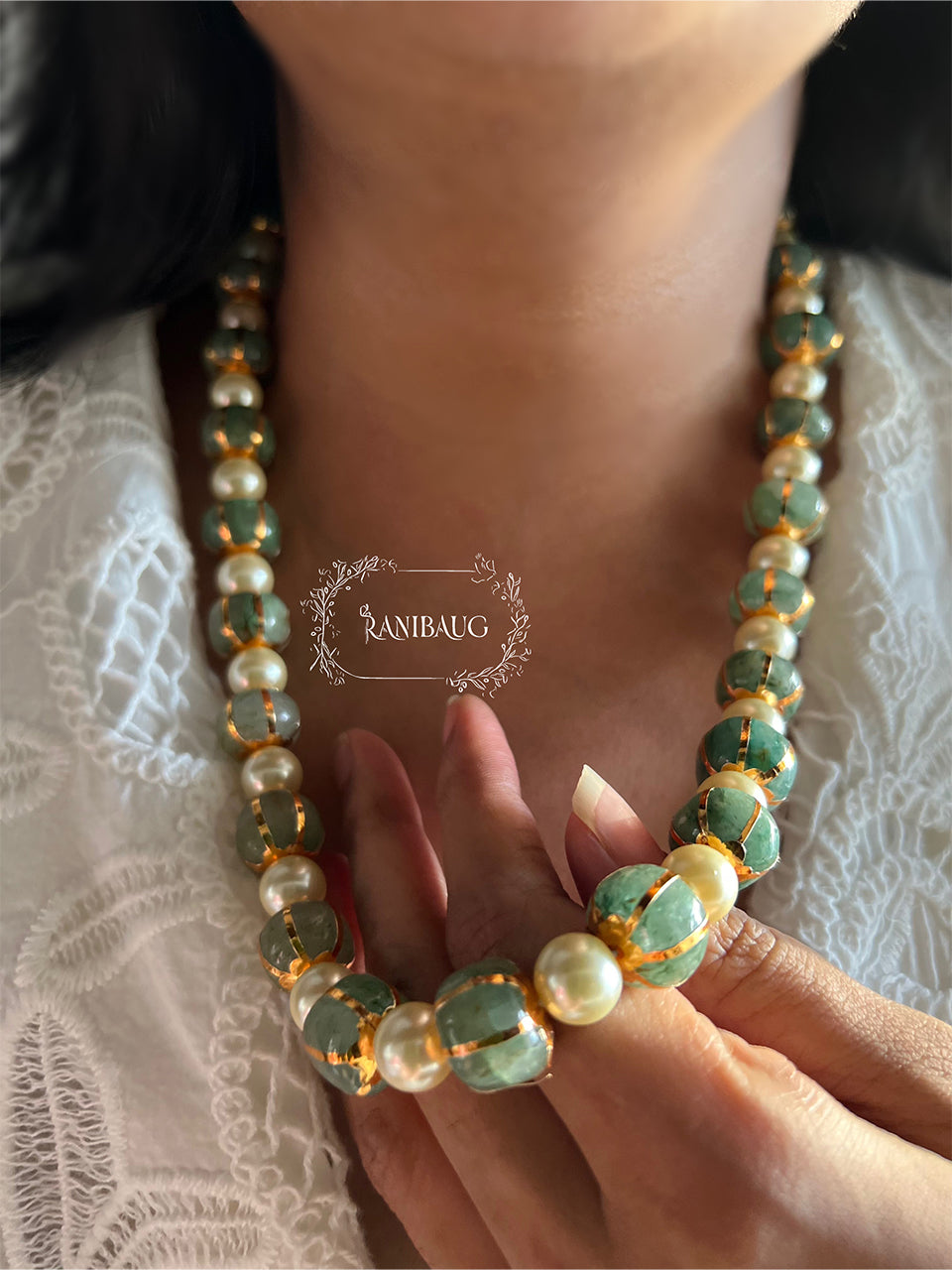 Priya Bead Necklace With Creamy Pearls And Emerald Crystals By Ranibaug