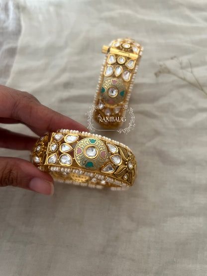 Priyanshi Kundan Pearl Bangles In Rich Gold Plating And Moon Motif By Ranibaug