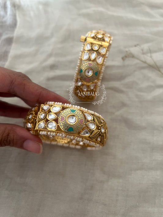 Priyanshi Kundan Pearl Bangles In Rich Gold Plating And Moon Motif By Ranibaug
