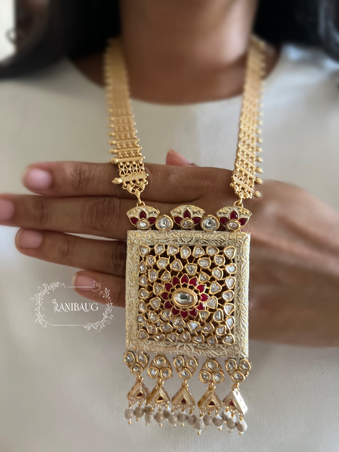 Raavya Polki Studded Rich Gold Finish White And Red Enamel Work Long Heritage Necklace Set By Ranibaug