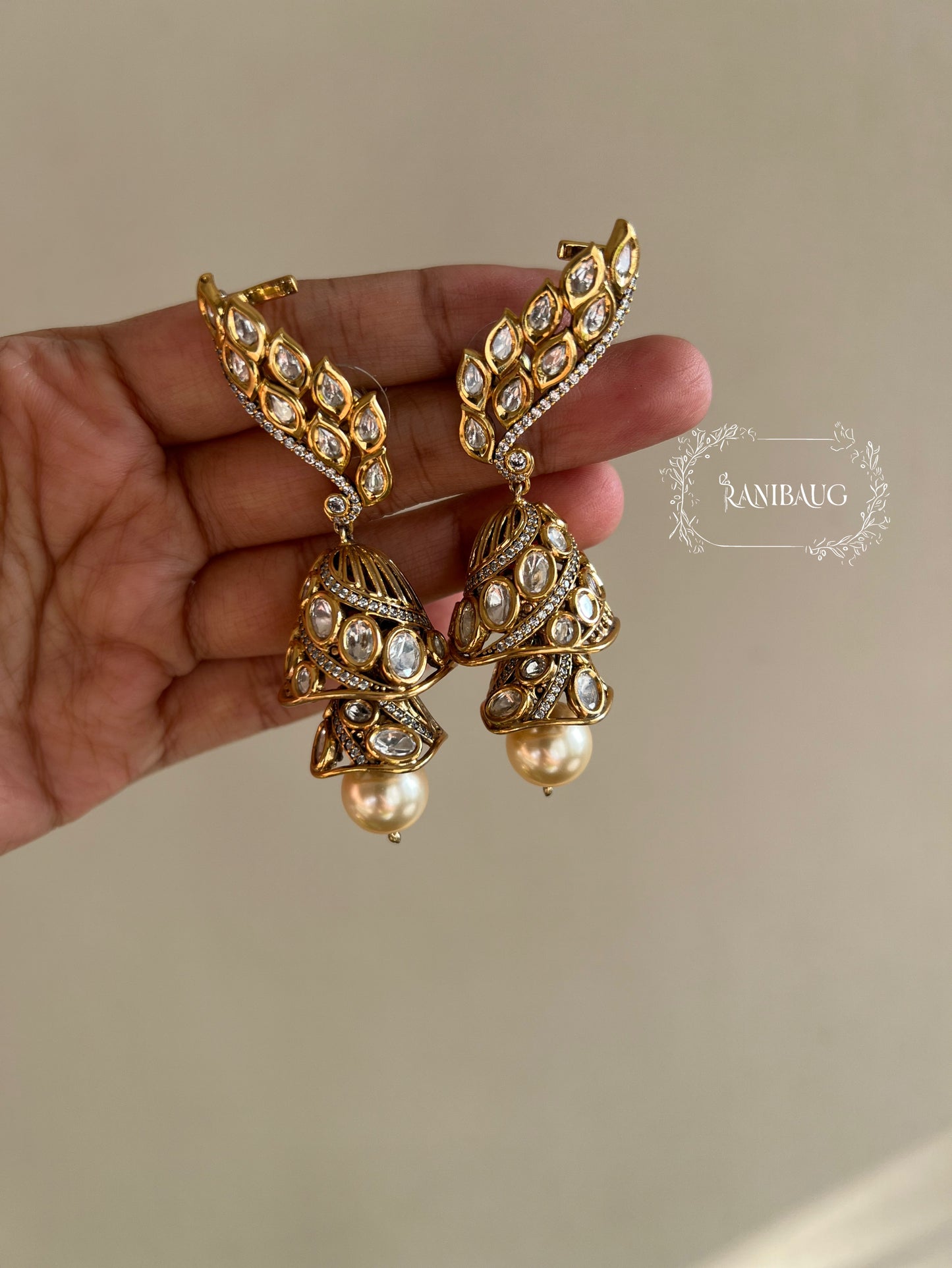 Rajkumari Royal Polki Ear Cuff Earrings With Dangling Two Layered Jhumkis And Oversized Pearl Kaanphool By Ranibaug | Earrings For 2026 Weddings