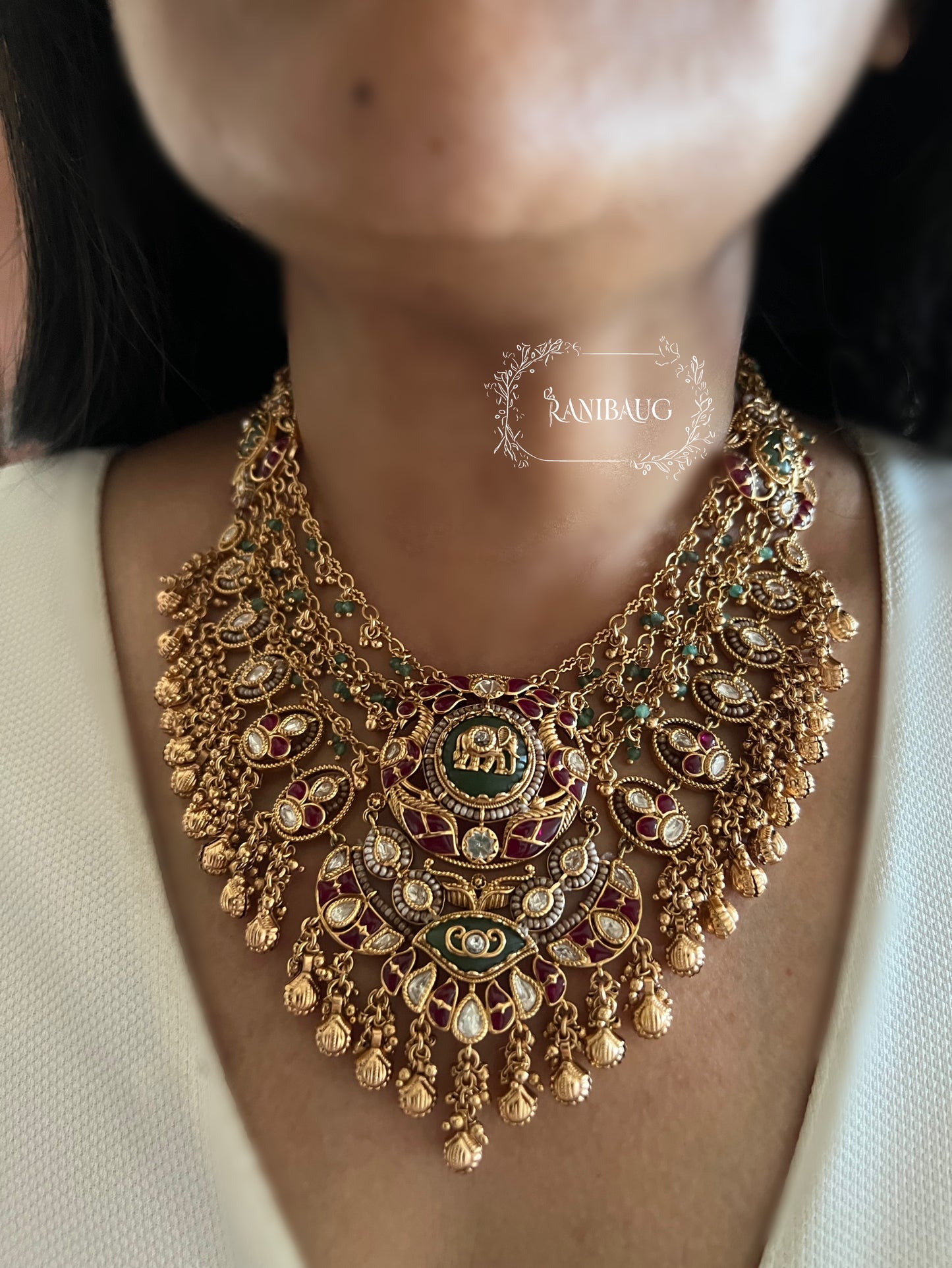 Rajnidhi Royal Heritage Elephant Motif Layered Gold Intricate Designer Necklace Set In Polki Emerald And Ruby Accents By Ranibaug