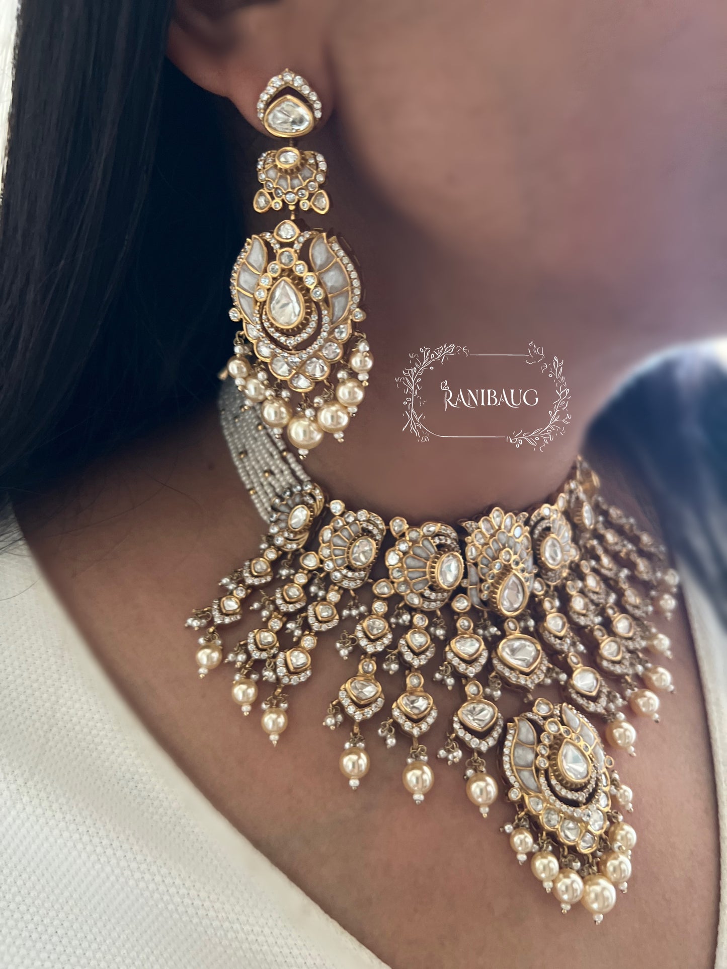 Rajnisha Polki Studded Zirconia And Pearl Adorned Enamel Gold Finish Necklace Jewelry Set With Maang Tikka By Ranibaug