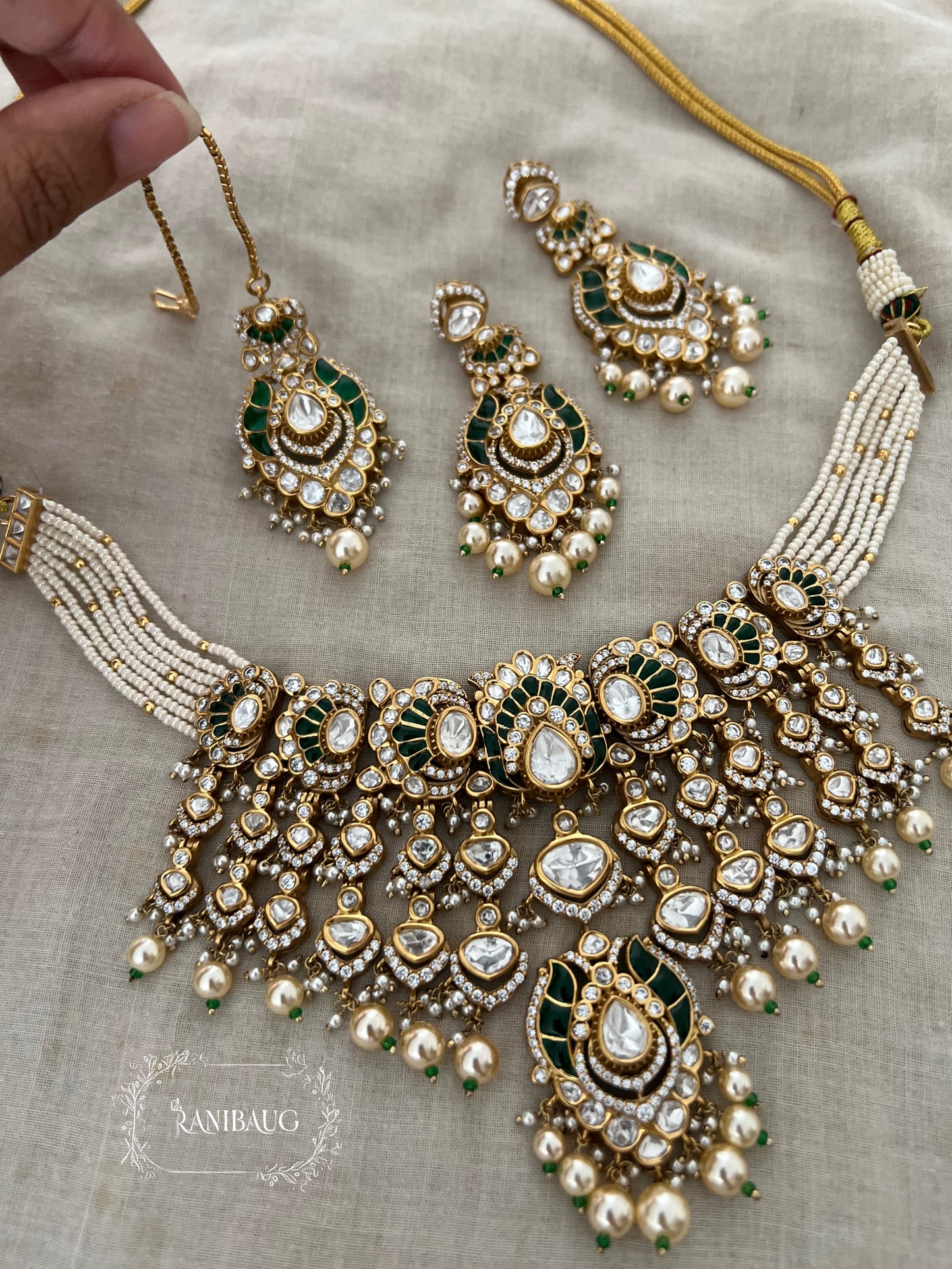Rajnisha Polki Studded Zirconia And Pearl Adorned Enamel Gold Finish Necklace Jewelry Set With Maang Tikka By Ranibaug
