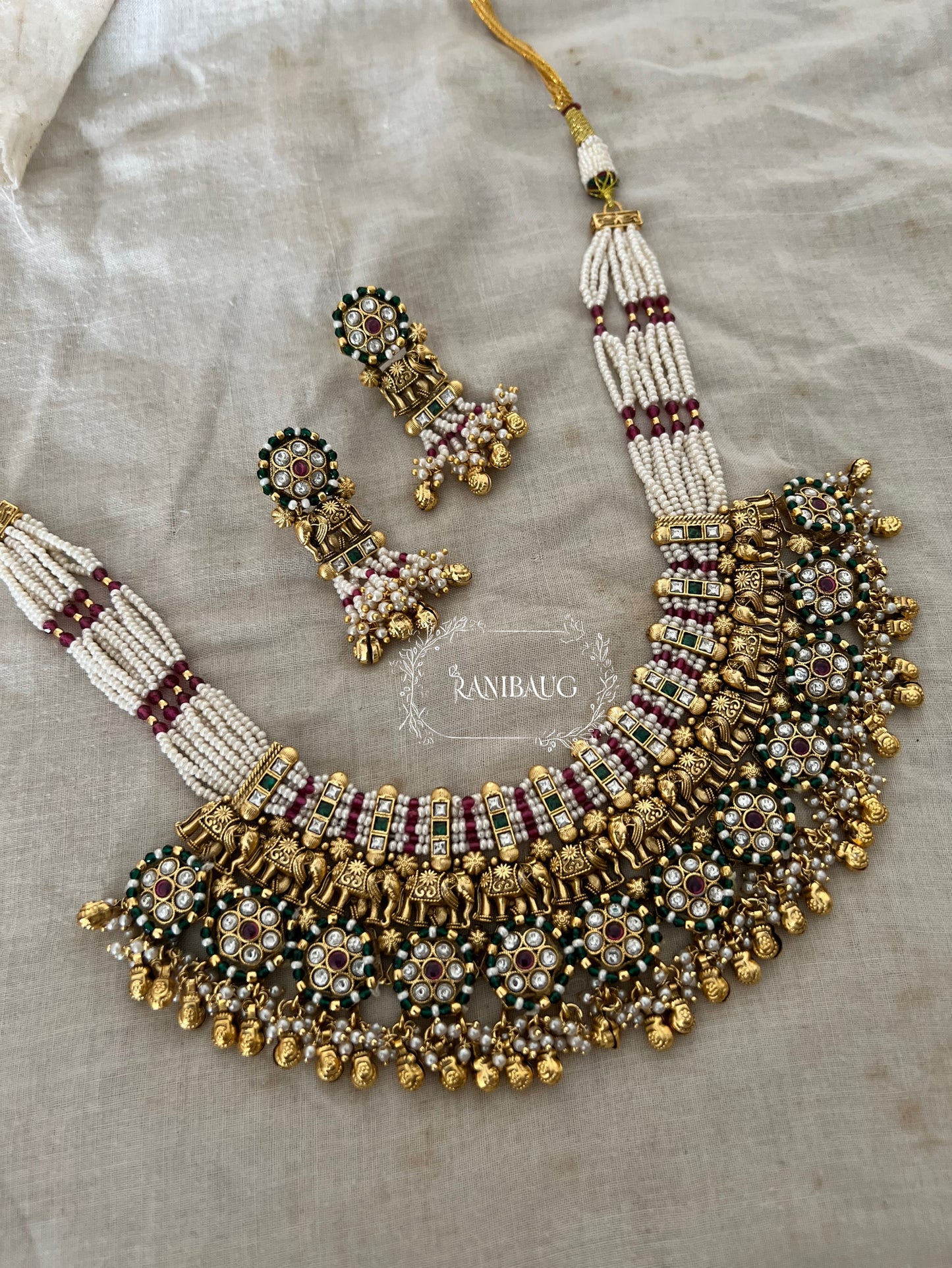 Rajwadi Heavy Designer Gold And Pearl Bead Fringe Studded Elephant Motif Statement Heritage Choker Necklace Set By Ranibaug
